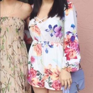 Floral long sleeved romper
